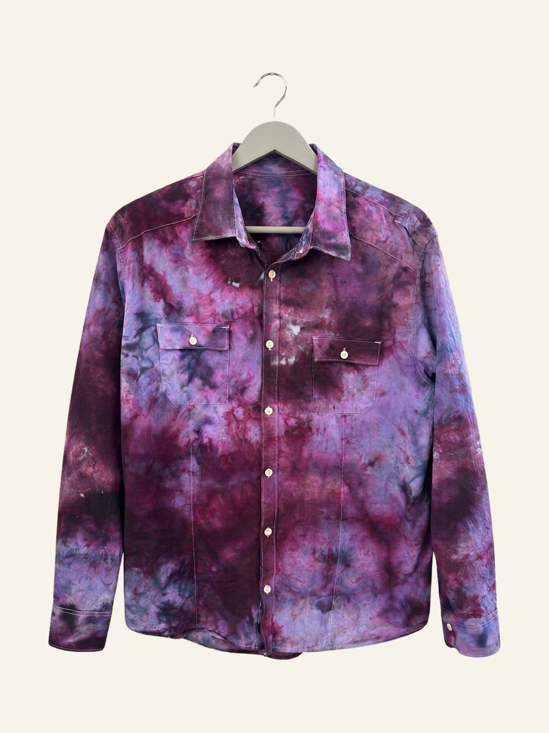 Hand ice-dyed cotton western shirt in purple, plum, and violet on a pale grey hanger